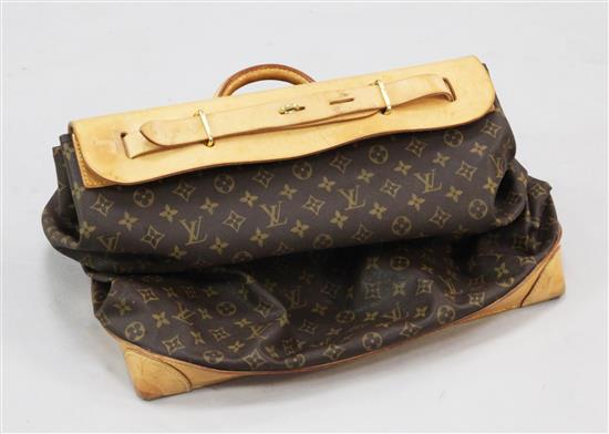 A Louis Vuitton travel bag, length 22in. not incl. handle